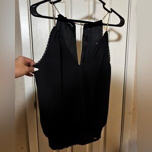 Black Bebe shirt with some nice gold chain as the straps
